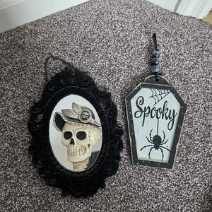 Spooky goth Halloween gallery wall decor.